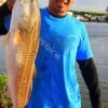 Andy Tran of Houston caught ths 34 inch tagger bull red on cut croaker