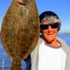 Barbara Singleton of Winnie TX fished a finger mullet to catch this BIGGA Flounder