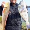 Craig Hicks of Houston caught this slot red and drum on live shrimp