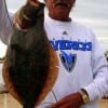 Dallas TX angler Henri Fontenot worked hard today for this one flounder which shows how difficult fishing was