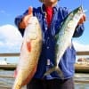Earnest Carrasco of Pasadena TX nabbed these nice redfish and Spanish Mackerel on shrimp while fishing the west wall of the surf