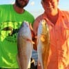 Father and Son, Phill and Tyler George of Liberty TX nabbed these two nice slot reds on live shrimp