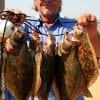 Galveston Island angler Rick Talley wade-fished Rollover Bay with Berkley Gulp to get this impressive flounder limit