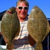 Gilchrist TX flounder pounder Chuck Meyers took these 17 and 20 inch flatfish on Berkley Gulp