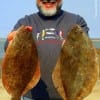 Hector Coria of Lufkin TX wade-fished Rollover Bay with Berkley Gulp for these nice flounder