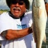 Leo Leal of Houston took this 23 inch slot red on a finger mullet