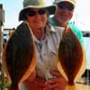 Linny and Adrian Gurganis of Tyler TX teamed up to catch these nice flounder on finger mullet
