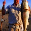 Mark Larousse of Beaumont caught and released this huge bull red from the surf fishing a finger mullet