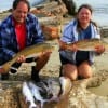 Mark and Connie Halverson of LaMarque TX waded the surf with finger mullet and Shad catching Bull and Slot reds along with croaker, drum, and gafftop