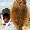 Monica Neals of Houston caught this nice flounder on a finger mullet