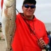 Sam Collins of Tarkington Prairie TX landed this nice 26inch slot red while fishing a finger mullet