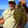 Walter Pleasants of Cleveland TX wade-fished Rollover Bay with Berkley Gulp for these nice flounder