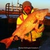 Alberto Gonzales of Dallas took this HUGE 41 inch Bull red from the surf fishing a finger mullet