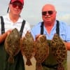 Bill Taylor and Terry Weir of Montgomery TX wade-fished Rollover Bay with Berkley Gulp for this Nov-limit of flounder