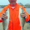 Cory Waddell of Houston night-fished with his son to catch two limits (20) of speckled trout on freelined live shrimp