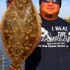 Danny Luangpakdy of Tomball TX took this nice 18 inch flounder on a finger mullet
