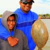 Father and son Thomas and Joseph Mathew teamed up to catch thier very first flounder, an 18 incher caught on finger mullet