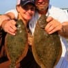 Fishin buds Chris Sullivan and Michelle McKenna of Onalaska teamed up to catch these flounder on finger mullet