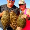 Fishin pals Chris Peckham and Linda Gonzales King teamed up to catch these nice flounder on finger mullet and Berkley Gulp