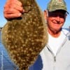 Frank Bunyard of Tarkington Prairie TX caught this 19 inch flounder on a Berkley Gulp