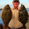 Frank -Moe- Bunyard of Tarkington Prairie TX hefts his Nov-Limit of flounder he took on Berkley Gulp