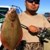 Herberto Banda of Anahauc TX wade fished Rollover Bay with Berkley Gulp for this nice flounder