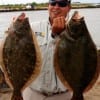 Houston Chronicle Angler Robert Aguirrie nabbed this 20 and 21 inch Nov-Limit of flounder on Berkley Gulp