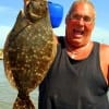 IT'SA BIGGUN yelped Dennis Boeker of High Island TX after landing this nice 19 inch flat fish on Berkley Gulp