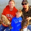Johnny and Misty Rutledge with 4 yr old Zachery of Tomball TX caught these nice flounder on Berkley Gulp