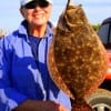 Judy Gentry of Tyler TX nabbed this 19-plus inch flounder while fishing a finger mullet