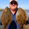Magnolia TX angler Ed Cooper fished finger mullet to catch these twin flatfish