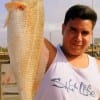 Renaldo Corona of Dayton TX nabbed this nice 22 inch slot red on a finger mullet
