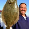 Richard Sanders of Crystal Beach TX was fishing a Berkley Gulp when this 21 inch flounder hit