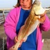 Sharlynn Schur of Conroe TX nabbed this nice 25 inch slot red on a finger mullet