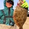 Stacy Crews of Crystal Beach TX landed this nice 18 inch flounder on a Berkley Gulp