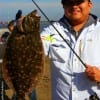Thion Tram of Houston nabbed this 20 inch flounder on Berkley Gulp