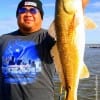 Tomball TX angler Danny Luangpakdy fished live shrimp to nab this nice 27 inch slot red