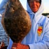 Winnie TX anglerette Barbara Singleton fished a finger mullet for this IMPRESSIVE 23 inch flounder
