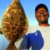 A happy JJ Foster of Houston just caught this nice flounder on shrimp