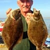 Billy Ray Hyman of New Waverly TX took these two nice flounder on finger mullet