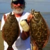 David Granitz of Pineridge TX hefts these nice flounder caught on Berkley Gulp