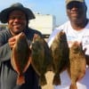 Fishin Buds Herbert Johnson and Abraham Cooper of Houston nabbed these nice flounder on finger mullet