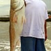 Gerardo Martinez of Houston fished shrimp to catch this HUGE 39sinch Bull Red
