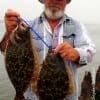 Gilchrist angler Capt Jack tethered up these two nice flounder fishing Berkley Gulp