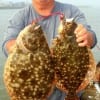 High Islander Joe Joe Andress fished finger mullet to catch BOTH of these, a 20 and 24 inch flounder