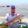 Thomas Flores of Houston took this HUGE 39 inch Bull Red on the Gulf side of the pass while fishing shrimp