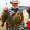 Zoom Fat Alberts and Berkley Gulp provided this limit of flounder for Gilchrist angler Capt Jack