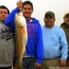 Father and sons, The Rodriguez and Felipe familia's of Houston and Mexico show off this 33 inch Bull Red caught by Esteban on shrimp