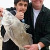Fishin Buds Buddy Higdon and Jaden Rashid of Houston share the limelight with this 24 inch Drum, Jaden's very first fish EVER