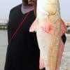 Houston angler Jimmie Cyrus caught this nice 27 inch slot red on shrimp